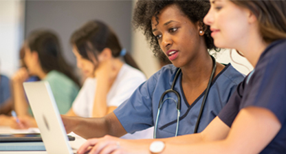 Nurses using computer